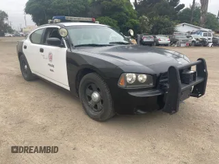 2007 Dodge Charger z VIN 2B3KA43G77HU8792, wystawiony jako Copart lot #60599175 z przebiegiem 127 672 mil mil oraz Czysty tytuł • Clean title. Historia ofert i sprzedaży dostępna na DreamBid. Obrazek 1.