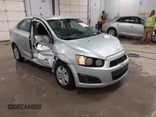 2014 Chevrolet Sonic LT with VIN 1G1JC5SG8E4107664, listed as a IAAI auction lot 41614306 with 128,946 mi miles and . Bid and sale history available at DreamBid. Image 1.
