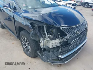2020 Lexus RX 350 z VIN 2T2AZMAA6LC177456, wystawiony jako IAAI lot #41940824 z przebiegiem 55 993 mil mil oraz . Historia ofert i sprzedaży dostępna na DreamBid. Obrazek 6.