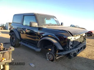 2022 Ford Bronco with VIN 1FMDE5CH7NLA89794, listed as a Copart auction lot 71090033 with 19,938 mi miles. Bid and sale history available at carsss.com. Image 4.