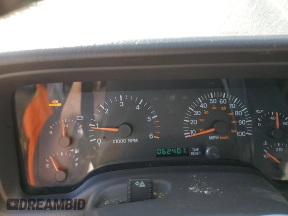 2001 Jeep Cherokee Sport z VIN 1J4FF58S61L612533, wystawiony jako Copart lot #76824714 z przebiegiem 62 401 mil mil oraz Szkoda całkowita • Salvage title. Historia ofert i sprzedaży dostępna na DreamBid. Obrazek 9.