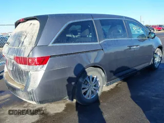 2014 Honda Odyssey EX-L with VIN 5FNRL5H61EB079739, listed as a IAAI auction lot 41659048 with 137,012 mi miles and . Bid and sale history available at carsss.com. Image 4.