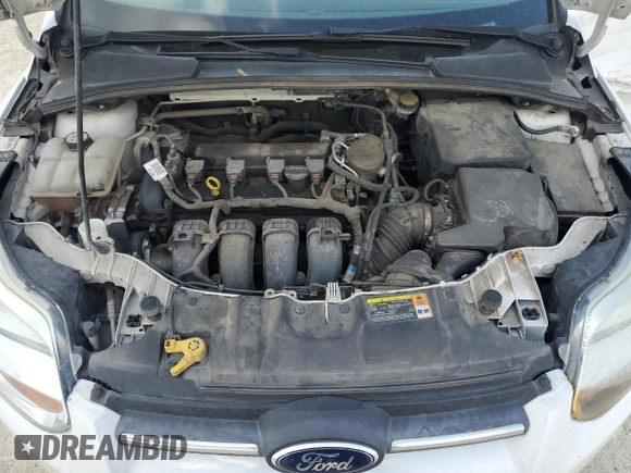 2013 Ford Focus SE z VIN 1FADP3F2XDL198801, wystawiony jako Copart lot #51985455 z przebiegiem 115 747 mil mil oraz Szkoda całkowita • Salvage title. Historia ofert i sprzedaży dostępna na DreamBid. Obrazek 11.