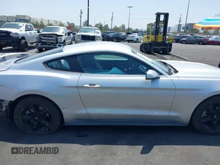 2015 Ford Mustang V6 with VIN 1FA6P8AM1F5342967, listed as a IAAI auction lot 42164817 with 106,700 mi miles and . Bid and sale history available at DreamBid. Image 14.