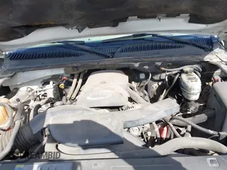 2004 Chevrolet Avalanche with VIN 3GNEC12T14G175831, listed as a IAAI auction lot 41928235 with 185,699 mi miles. Bid and sale history available at carsss.com. Image 10.