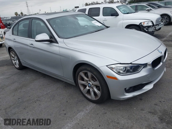 2013 BMW 3 Series 335i with VIN WBA3A9C56DF475464, listed as a IAAI auction lot 42190546 with 115,001 mi miles and . Bid and sale history available at DreamBid. Image 1.