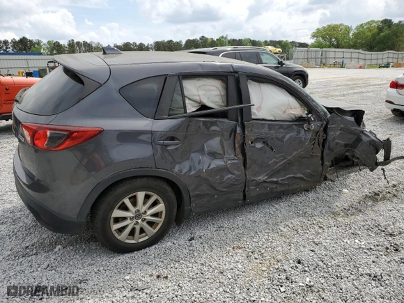 2015 Mazda CX-5 Touring with VIN JM3KE2CYXF0525607, listed as a Copart auction lot 51949355 with 0 mi miles and Clean Title. Bid and sale history available at carsss.com. Image 3.