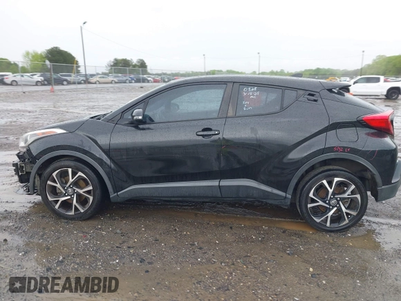 2018 Toyota C-HR XLE with VIN NMTKHMBX4JR032773, listed as a IAAI auction lot 41957588 with 100,691 mi miles. Bid and sale history available at carsss.com. Image 15.