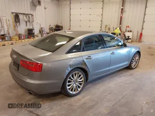 2014 Audi A6 Premium Plus with VIN WAUGFAFCXEN085327, listed as a IAAI auction lot 42094205 with 97,389 mi miles and . Bid and sale history available at DreamBid. Image 4.