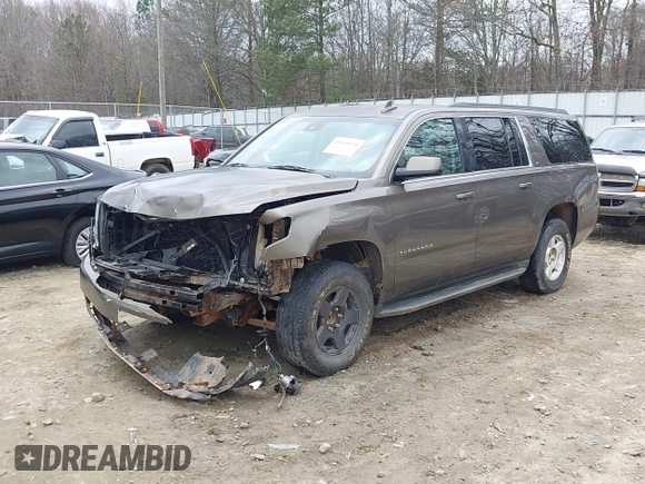 2015 Chevrolet Suburban LT z VIN 1GNSCJKC6FR675585, wystawiony jako IAAI lot #41510570 z przebiegiem 156 818 mil mil oraz . Historia ofert i sprzedaży dostępna na DreamBid. Obrazek 19.