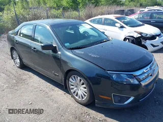 2010 Ford Fusion Hybrid z VIN 3FADP0L38AR273889, wystawiony jako IAAI lot #42384843 z przebiegiem 261 871 mil mil oraz . Historia ofert i sprzedaży dostępna na DreamBid. Obrazek 1.