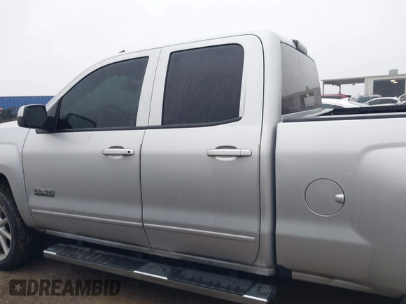 2018 Chevrolet Silverado 1500 LT with VIN 1GCRCREC4JZ287085, listed as a IAAI auction lot 41450057 with 79,275 mi miles and . Bid and sale history available at DreamBid. Image 14.