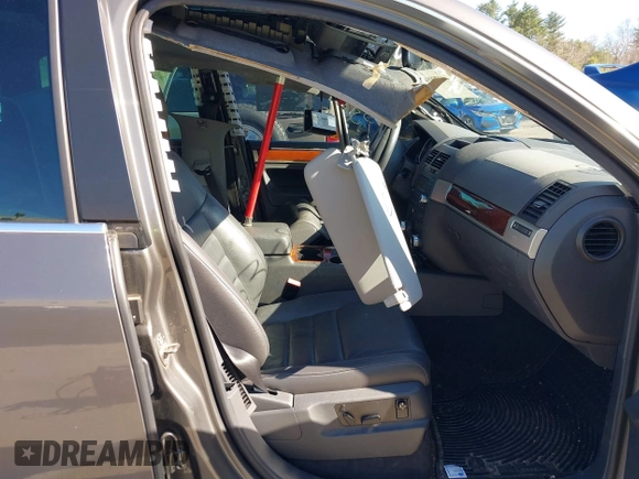 2010 Volkswagen Touareg VR6 with VIN WVGBF7A96AD004069, listed as a IAAI auction lot 41972994 with Not Provided miles and . Bid and sale history available at DreamBid. Image 5.