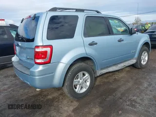 2009 Ford Escape Hybrid with VIN 1FMCU49309KB71172, listed as a IAAI auction lot 40971257 with 118,689 mi miles. Bid and sale history available at carsss.com. Image 4.