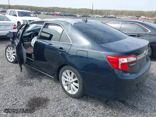 2013 Toyota Camry Hybrid LE with VIN 4T1BD1FK5DU076612, listed as a IAAI auction lot 42000025 with 210,000 mi miles. Bid and sale history available at carsss.com. Image 3.