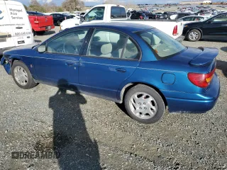 2000 Saturn SL z VIN 1G8ZK5279YZ155916, wystawiony jako Copart lot #44225105 z przebiegiem 97 788 mil mil oraz Szkoda całkowita • Salvage title. Historia ofert i sprzedaży dostępna na DreamBid. Obrazek 2.