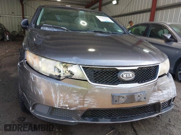 2010 Kia Forte EX with VIN KNAFU4A26A5882153, listed as a IAAI auction lot 41904559 with 162,554 mi miles. Bid and sale history available at carsss.com. Image 6.