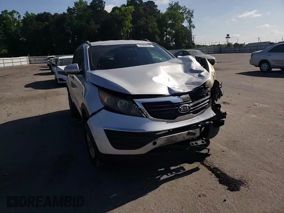 2011 Kia Sportage LX z VIN KNDPBCA2XB7102202, wystawiony jako Copart lot #55606785 z przebiegiem 84 311 mil mil oraz Szkoda całkowita • Salvage title. Historia ofert i sprzedaży dostępna na DreamBid. Obrazek 14.