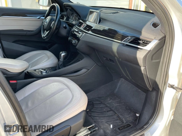 2017 BMW X1 sDrive28i with VIN WBXHU7C39H5H34971, listed as a Copart auction lot 51869265 with 108,051 mi miles and Clean Title. Bid and sale history available at carsss.com. Image 5.