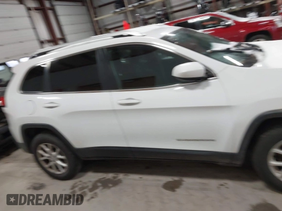 2015 Jeep Cherokee Latitude z VIN 1C4PJMCB4FW635406, wystawiony jako IAAI lot #41168412 z przebiegiem 131 089 mil mil oraz . Historia ofert i sprzedaży dostępna na DreamBid. Obrazek 13.