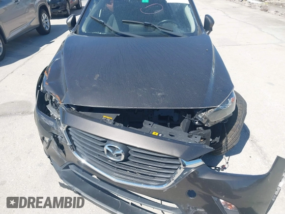 2016 Mazda CX-3 Touring with VIN JM1DKBC7XG0114940, listed as a IAAI auction lot 41777630 with 71,275 mi miles and . Bid and sale history available at DreamBid. Image 12.