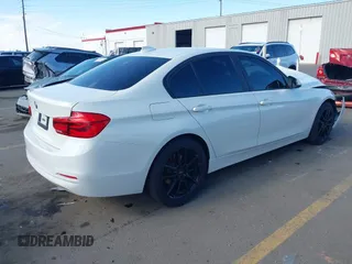 2018 BMW 3 Series 320i xDrive with VIN WBA8A3C59JA505164, listed as a IAAI auction lot 41959756 with 63,395 mi miles and . Bid and sale history available at DreamBid. Image 4.