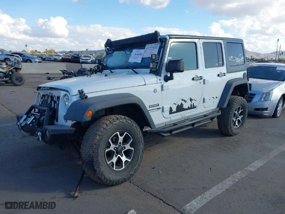 2018 Jeep Wrangler JK Unlimited Sport S with VIN 1C4BJWDG8JL908180, listed as a IAAI auction lot 41377025 with 70,209 mi miles. Bid and sale history available at carsss.com. Image 2.