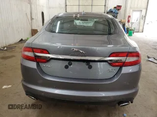 2015 Jaguar XF Portfolio with VIN SAJWJ0FF8F8U65883, listed as a Copart auction lot 55783945 with 133,431 mi miles and Salvage Title. Bid and sale history available at DreamBid. Image 6.