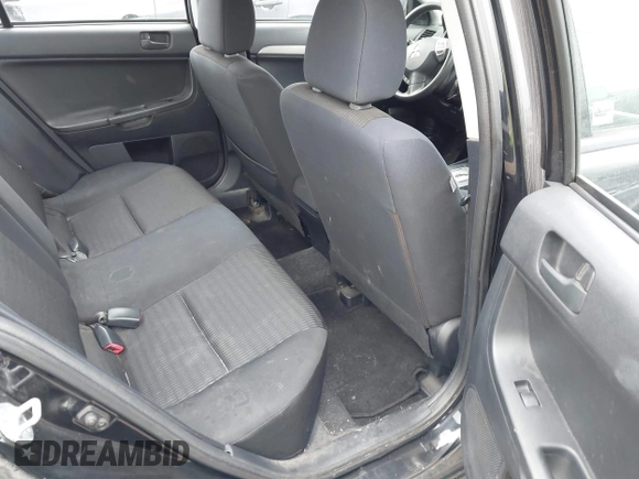 2012 Mitsubishi Lancer SE with VIN JA32V2FW9CU005808, listed as a IAAI auction lot 41920898 with 168,487 mi miles and . Bid and sale history available at DreamBid. Image 8.