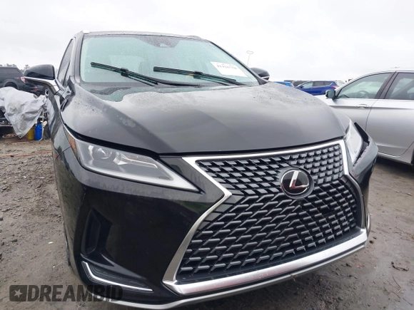 2021 Lexus RX with VIN 2T2HZMAA0MC201749, listed as a IAAI auction lot 41426758 with 148,064 mi miles. Bid and sale history available at carsss.com. Image 12.