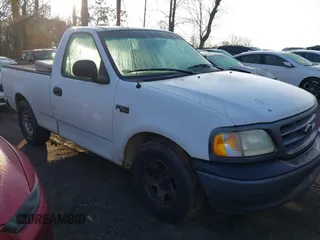 2002 Ford F-150 XL with VIN 1FTRF172X2NB18372, listed as a IAAI auction lot 41478280 with 240,736 mi miles. Bid and sale history available at carsss.com. Image 1.