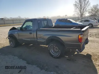 1999 Mazda B-Series 2WD Truck SX with VIN 4F4YR12C5XTM24067, listed as a Copart auction lot 85241964 with 219,030 mi miles and Salvage Title. Bid and sale history available at carsss.com. Image 2.