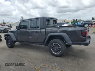 2023 Jeep Gladiator Sport с VIN 1C6HJTAG6PL584627, выставлен на аукционе Copart как лот 65161815 с пробегом 7 020 миль миль и Чистый • Clean title. История ставок и продаж доступна на DreamBid. Изображение 2.