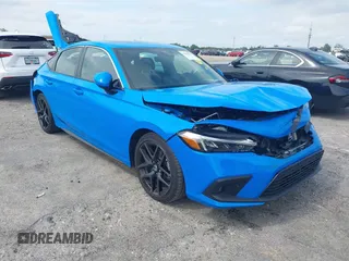 2024 Honda Civic Sport Touring z VIN 19XFL1G8XRE028797, wystawiony jako IAAI lot #41629613 z przebiegiem 20 594 mil mil oraz . Historia ofert i sprzedaży dostępna na DreamBid. Obrazek 1.