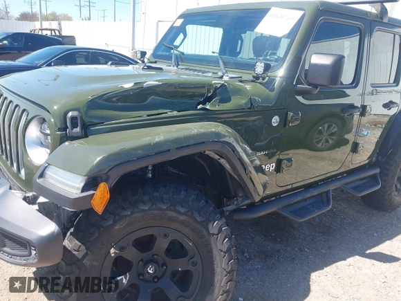 2020 Jeep Wrangler Unlimited Sahara High Altitude with VIN 1C4HJXEG8LW283103, listed as a IAAI auction lot 41830769 with 39,447 mi miles and . Bid and sale history available at DreamBid. Image 6.