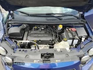 2014 Chevrolet Sonic LT z VIN 1G1JC5SH2E4140894, wystawiony jako Copart lot #55408215 z przebiegiem 122 783 mil mil oraz Szkoda całkowita • Salvage title. Historia ofert i sprzedaży dostępna na DreamBid. Obrazek 11.