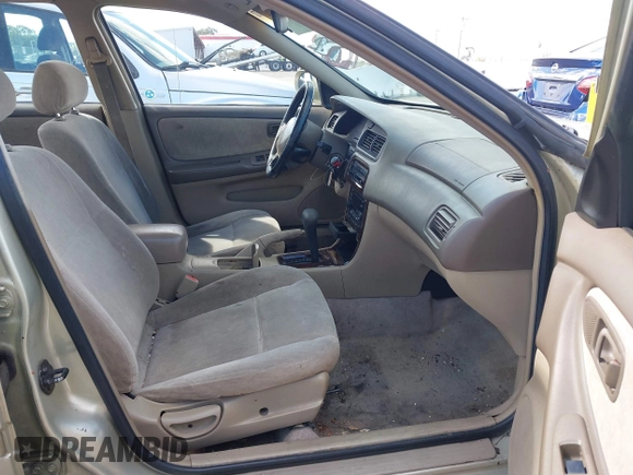 1999 Nissan Altima XE with VIN 1N4DL01D6XC179556, listed as a IAAI auction lot 41783234 with 129,064 mi miles. Bid and sale history available at carsss.com. Image 5.
