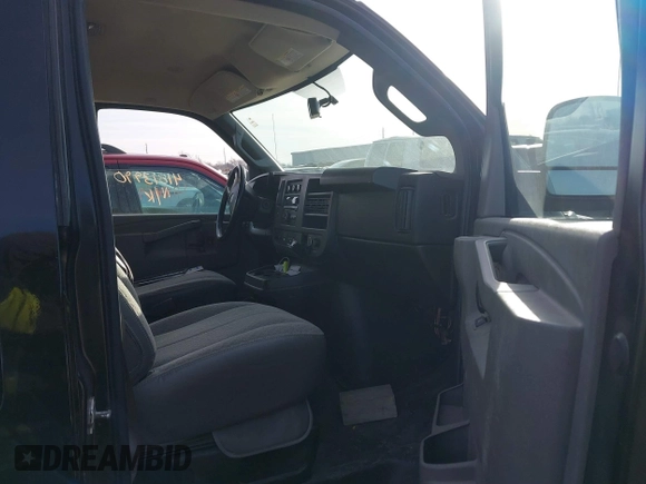 2016 Chevrolet Express Cargo Van with VIN 1GCWGAFGXG1260362, listed as a IAAI auction lot 41813990 with 141,741 mi miles. Bid and sale history available at carsss.com. Image 5.
