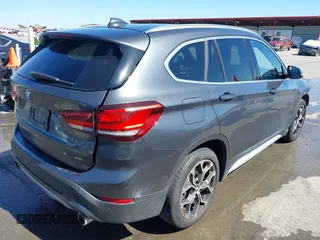 2020 BMW X1 sDrive28i with VIN WBXJG7C0XL3L92799, listed as a IAAI auction lot 41752133 with 92,328 mi miles. Bid and sale history available at carsss.com. Image 4.