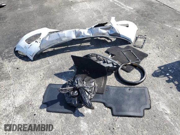 2017 Kia Sorento SXL z VIN 5XYPK4A54HG250891, wystawiony jako Copart lot #57791565 z przebiegiem Nie podano mil oraz Szkoda całkowita • Salvage title. Historia ofert i sprzedaży dostępna na DreamBid. Obrazek 12.