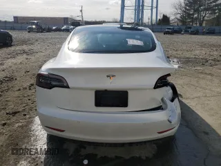 2021 Tesla Model 3 Standard Range Plus z VIN 5YJ3E1EA4MF099600, wystawiony jako Copart lot #49917095 z przebiegiem 44 719 mil mil oraz Szkoda całkowita • Salvage title. Historia ofert i sprzedaży dostępna na DreamBid. Obrazek 6.
