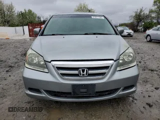 2007 Honda Odyssey EX-L with VIN 5FNRL38607B011150, listed as a Copart auction lot 51811195 with 218,189 mi miles and Salvage Title. Bid and sale history available at carsss.com. Image 5.