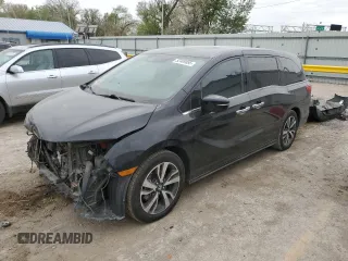 2018 Honda Odyssey Elite with VIN 5FNRL6H92JB024856, listed as a Copart auction lot 52409895 with 123,264 mi miles and Salvage title. Bid and sale history available at DreamBid. Image 1.