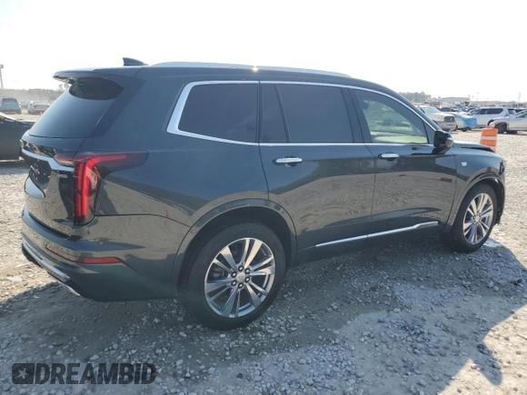 2022 Cadillac XT6 Premium Luxury with VIN 1GYKPCRS1NZ104567, listed as a Copart auction lot 47173005 with 54,541 mi miles and Clean Title. Bid and sale history available at carsss.com. Image 3.