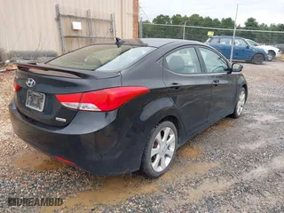 2013 Hyundai Elantra GLS PZEV with VIN KMHDH4AE7DU728890, listed as a IAAI auction lot 40365489 with 230,693 mi miles. Bid and sale history available at carsss.com. Image 4.