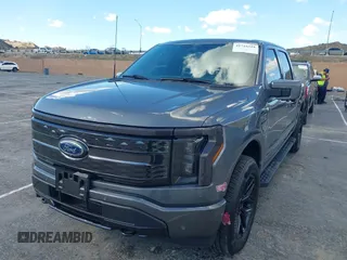 2023 Ford F-150 Lightning Pro with VIN 1FT6W1EV8PWG25191, listed as a IAAI auction lot 41716529 with 5,191 mi miles and . Bid and sale history available at DreamBid. Image 2.