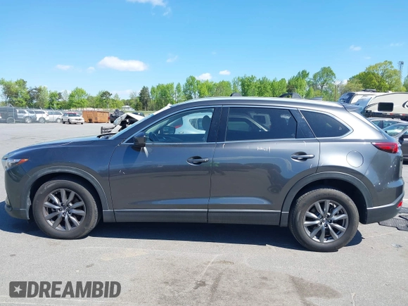 2021 Mazda CX-9 Touring with VIN JM3TCACY7M0503484, listed as a IAAI auction lot 42013262 with 63,777 mi miles and . Bid and sale history available at DreamBid. Image 15.