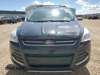 2013 Ford Escape SEL with VIN 1FMCU9H94DUA50063, listed as a Copart auction lot 63008005 with 225,421 mi miles and Salvage title. Bid and sale history available at DreamBid. Image 5.