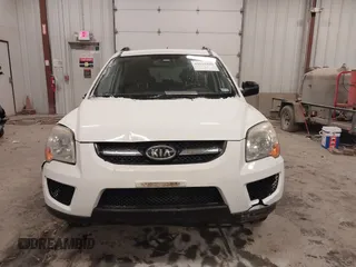 2010 Kia Sportage LX with VIN KNDKGCA35A7718764, listed as a IAAI auction lot 41512368 with 122,420 mi miles and . Bid and sale history available at carsss.com. Image 12.