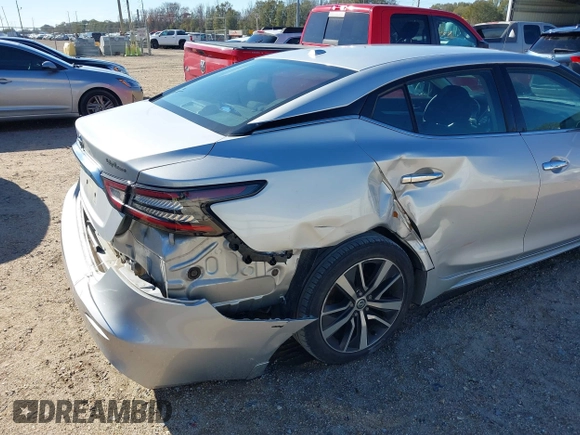 2019 Nissan Maxima SV with VIN 1N4AA6AV0KC371696, listed as a IAAI auction lot 41240863 with 143,348 mi miles and . Bid and sale history available at DreamBid. Image 6.